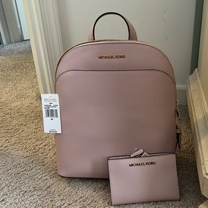 Brand New, Never Used Micheal Kors light pink Lg Dome Backpack